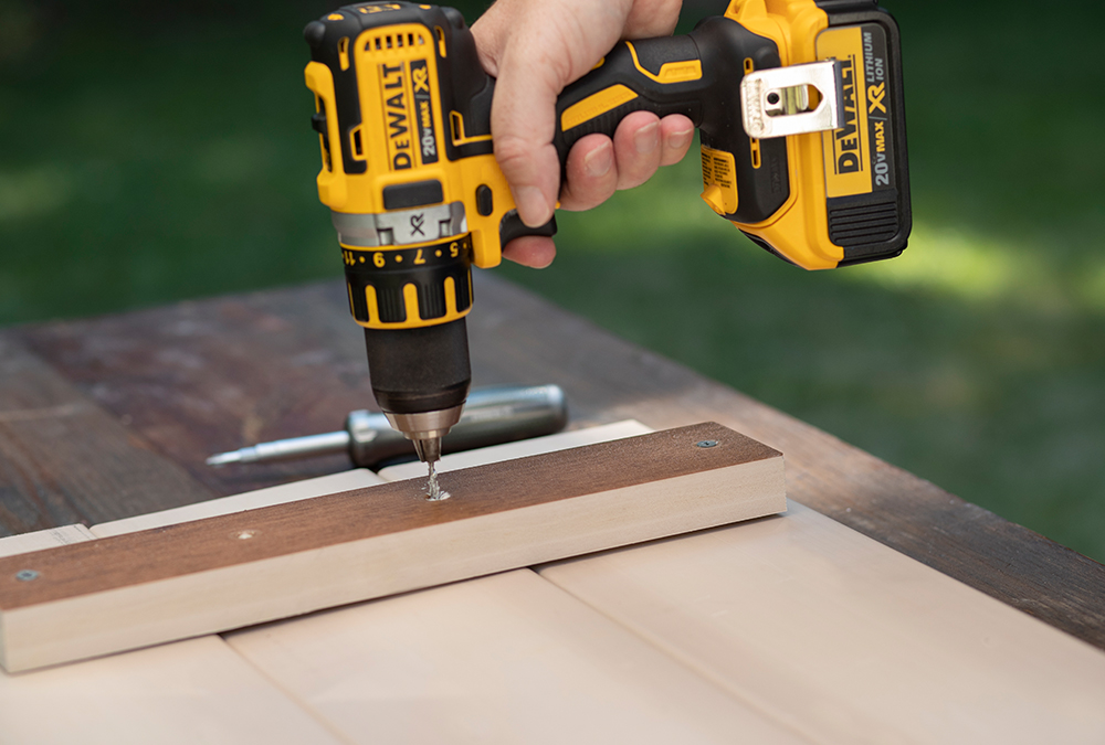 drilling wooden legs with a drill